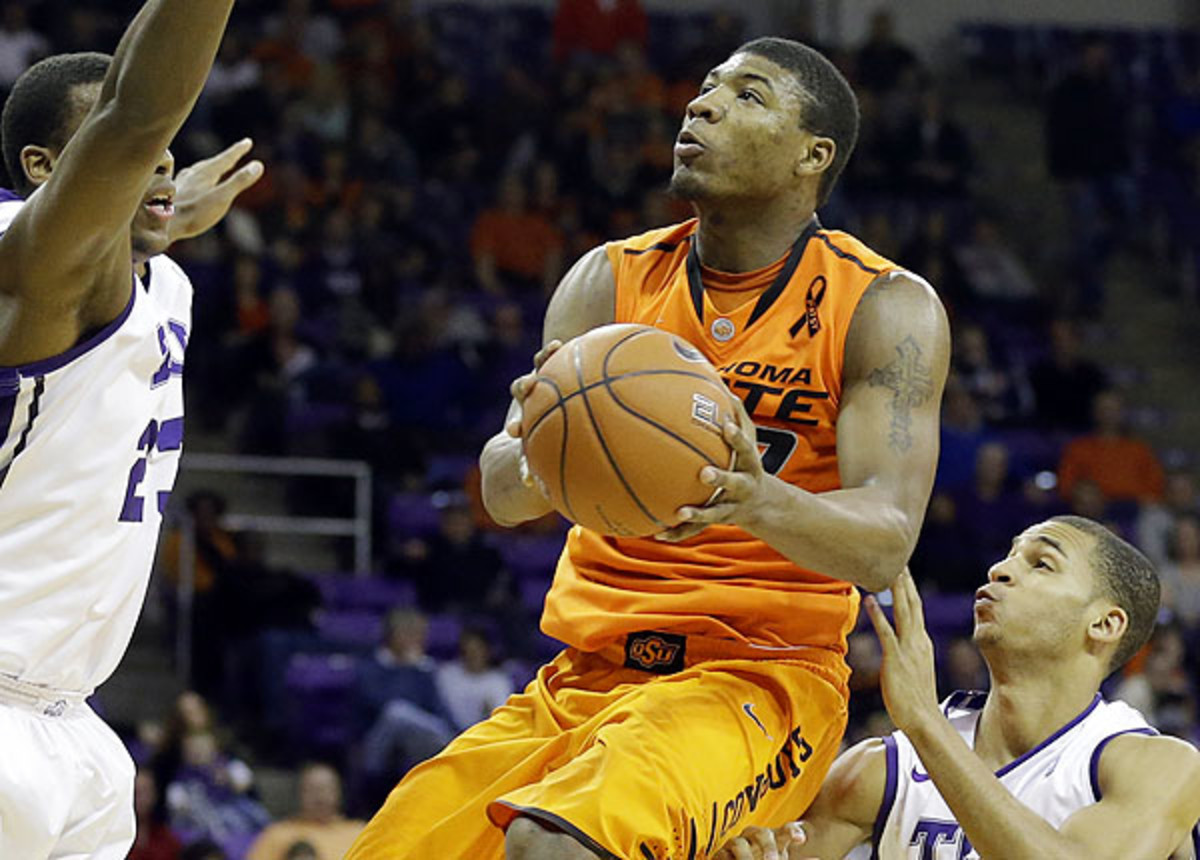 Marcus Smart appeared NBA-ready as he bullied defenders with his strong and power. (Tony Gutierrez/AP)