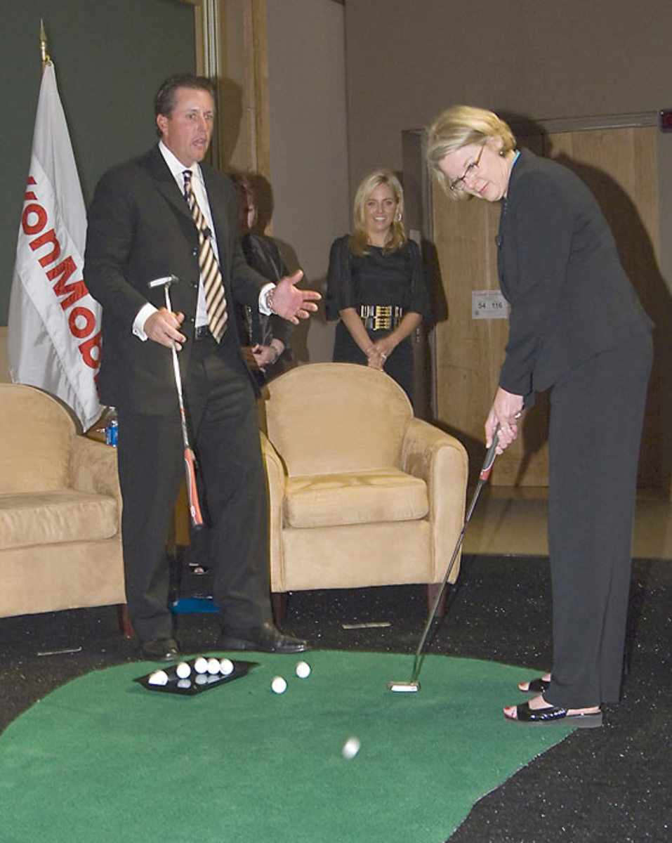 Phil Mickelson and Margaret Spellings