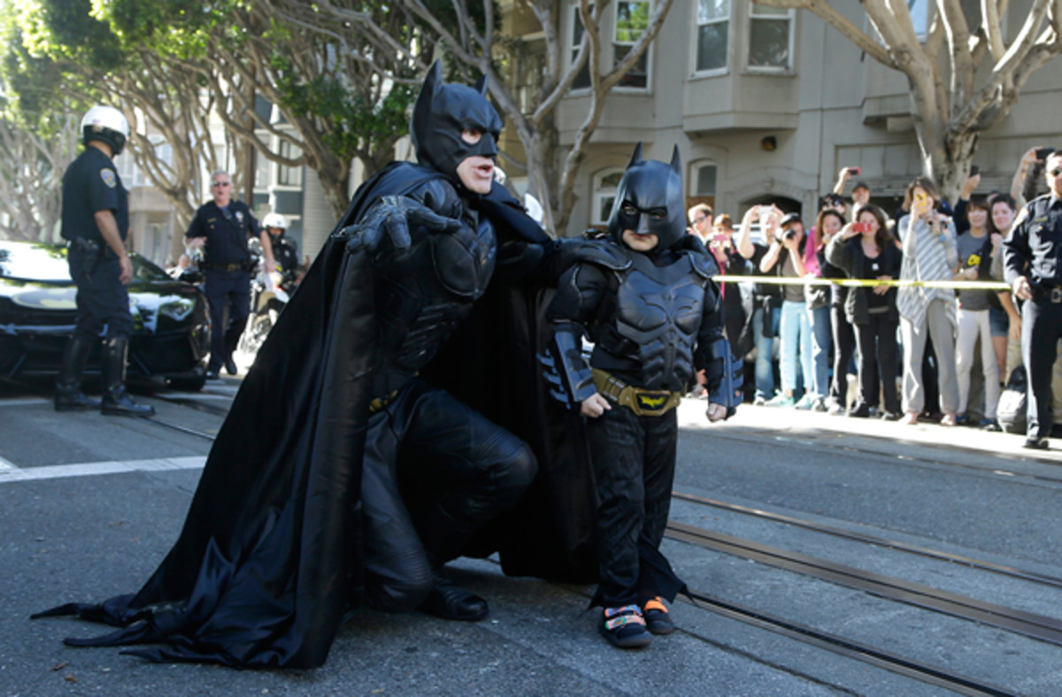 BatKid prepares for his latest adventure, and the 49ers are impressed. (Jeff Chiu/AP)