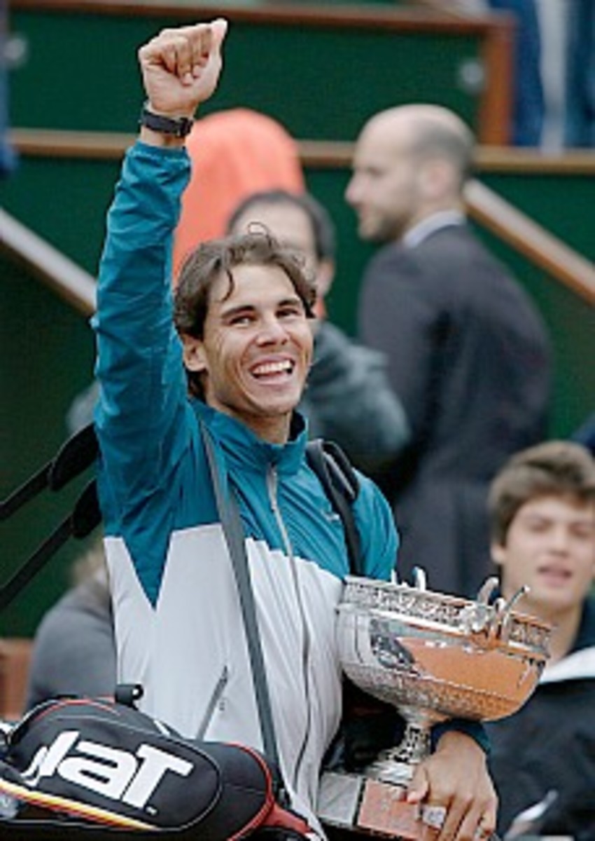 Nadal salutes the crowd. (Kenzo Tribouillard/AFP/Getty Images)