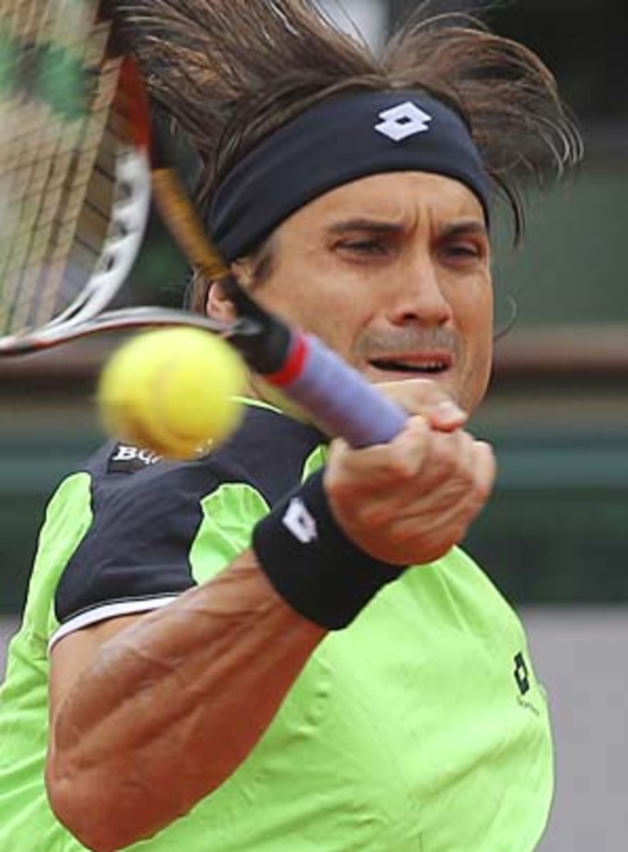 Ferrer, 31, is into his first Slam final in 42 major appearances. (Michel Euler/AP)