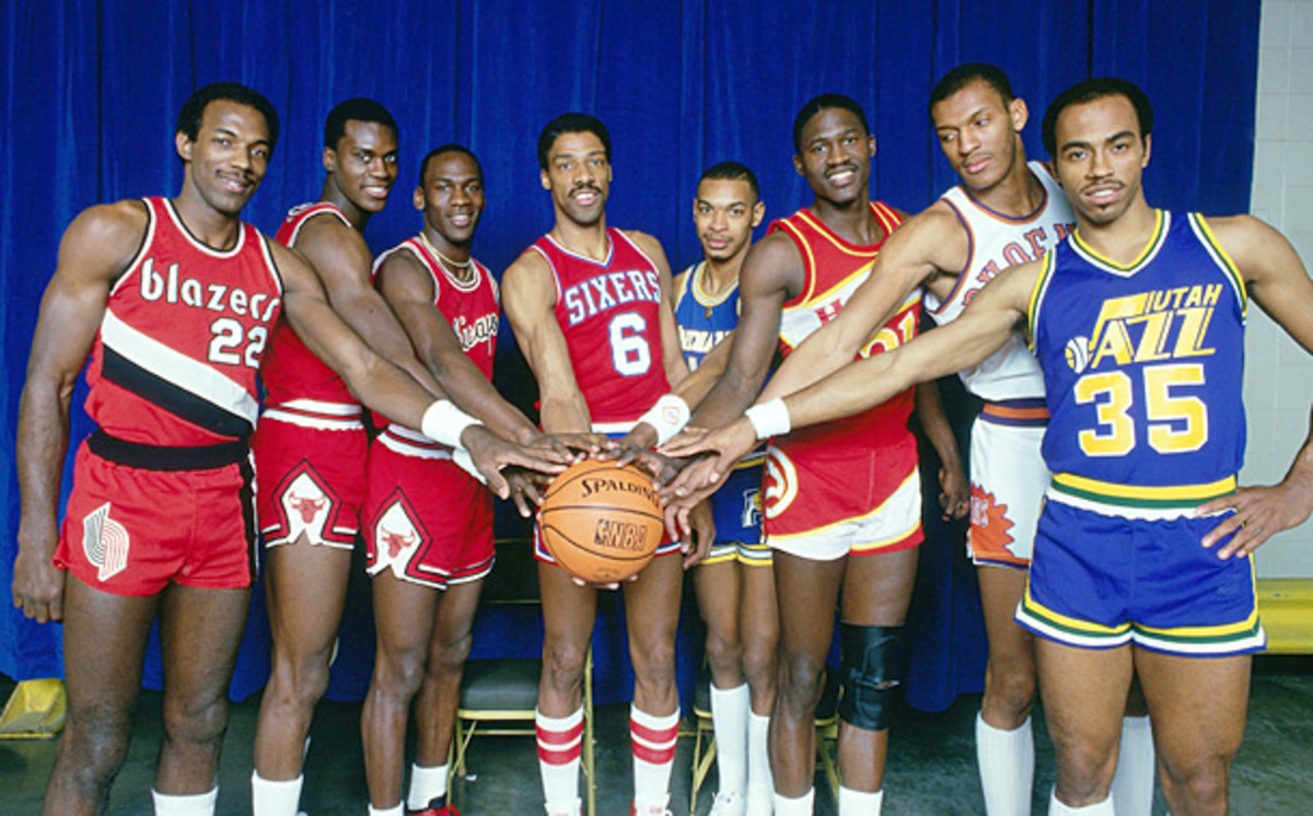 Jordan poses with Clyde Drexler, Orlando Woolridge, Julius Erving, Terrence Stansbury, Dominique Wilkins, Larry Nance and Darrell Griffith before the 1985 Slam-Dunk Contest. (Andrew D. Bernstein/NBAE/Getty Images)