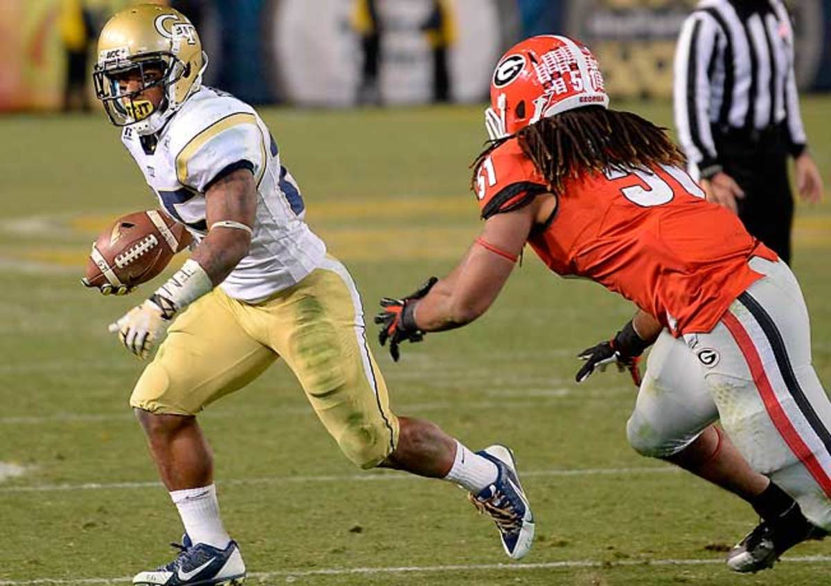 Georgia Tech tailback Robert Godhigh (in white) averages 10.1 yards per carry. (AP Photo/David Tulis)