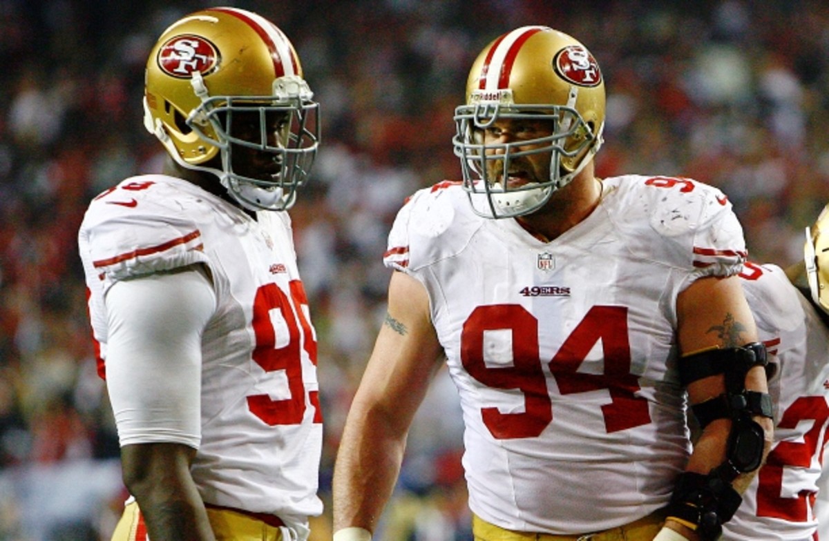 Justin Smith (94) and Aldon Smith form one of the league's most feared duos. (Kevin Terrell, AP)