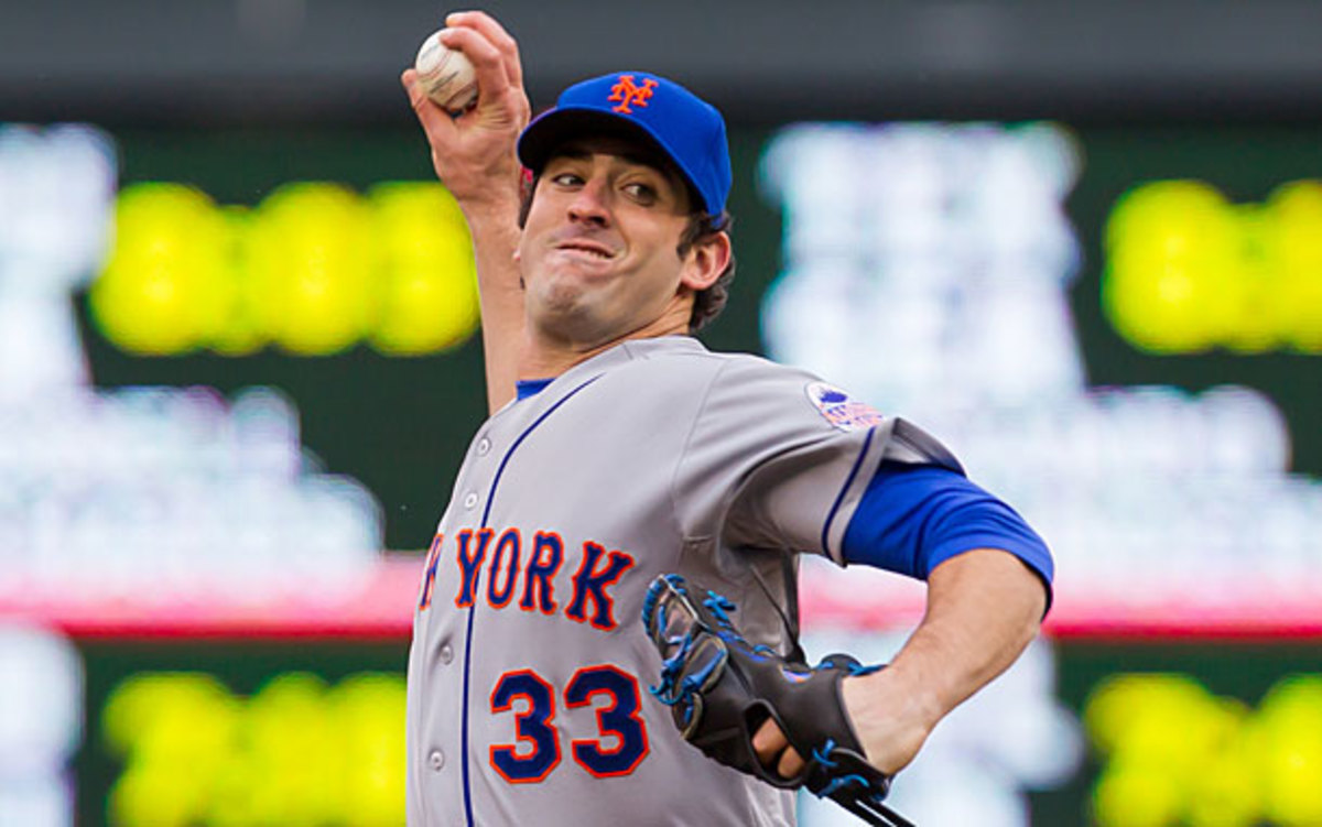 New York Mets pitcher Matt Harvey peels off the uniform in the