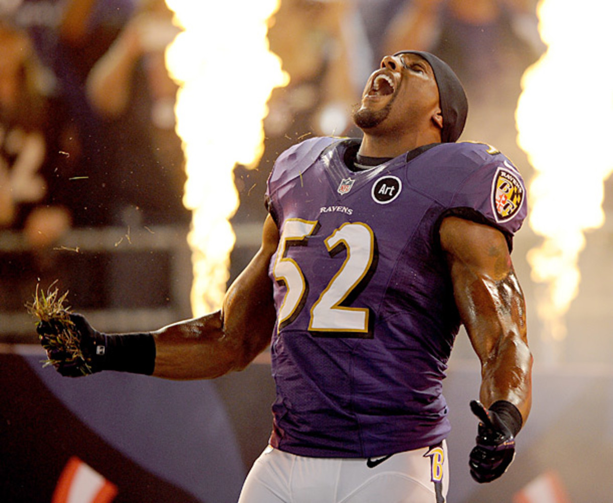 Ray Lewis fires himself and the Baltimore crowd up before a September game against New England. (Patrick Smith/Getty Images)