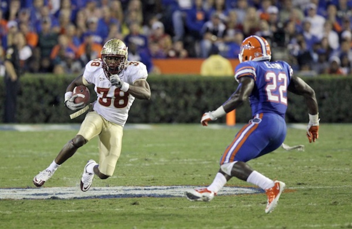 Florida's Matt Elam is seen here in a rare moment of him not hitting somebody. (AP)