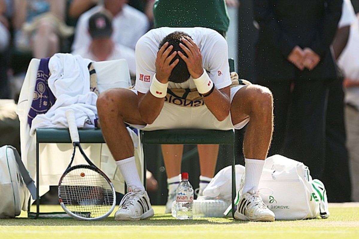 Djokovic tries to keep his cool. (Clive Brunskill/Getty Images)