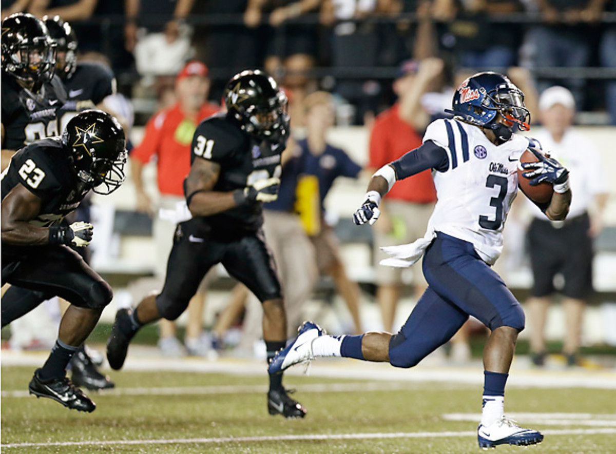 Mississippi running back Jeff Scott saved the Rebels with this 75-yard TD run. (Mark Humphrey/AP)