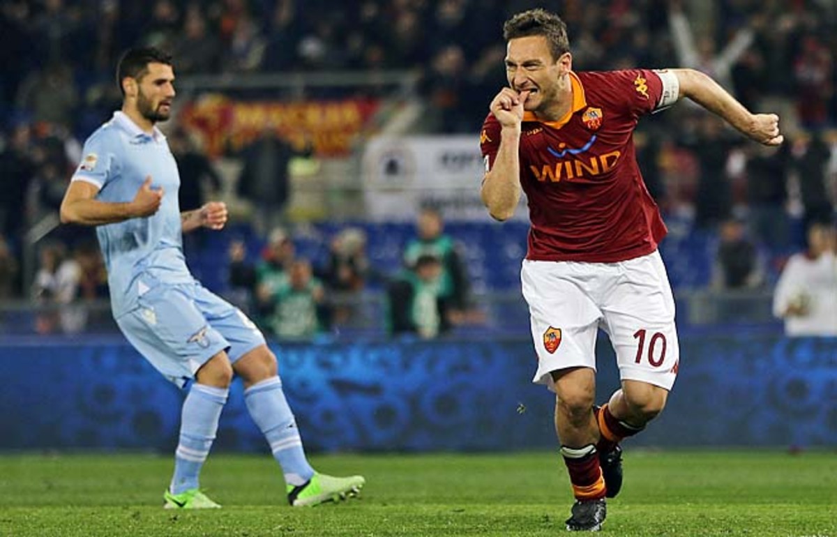 Francesco Totti celebrates after converting his penalty in the 56th minute.