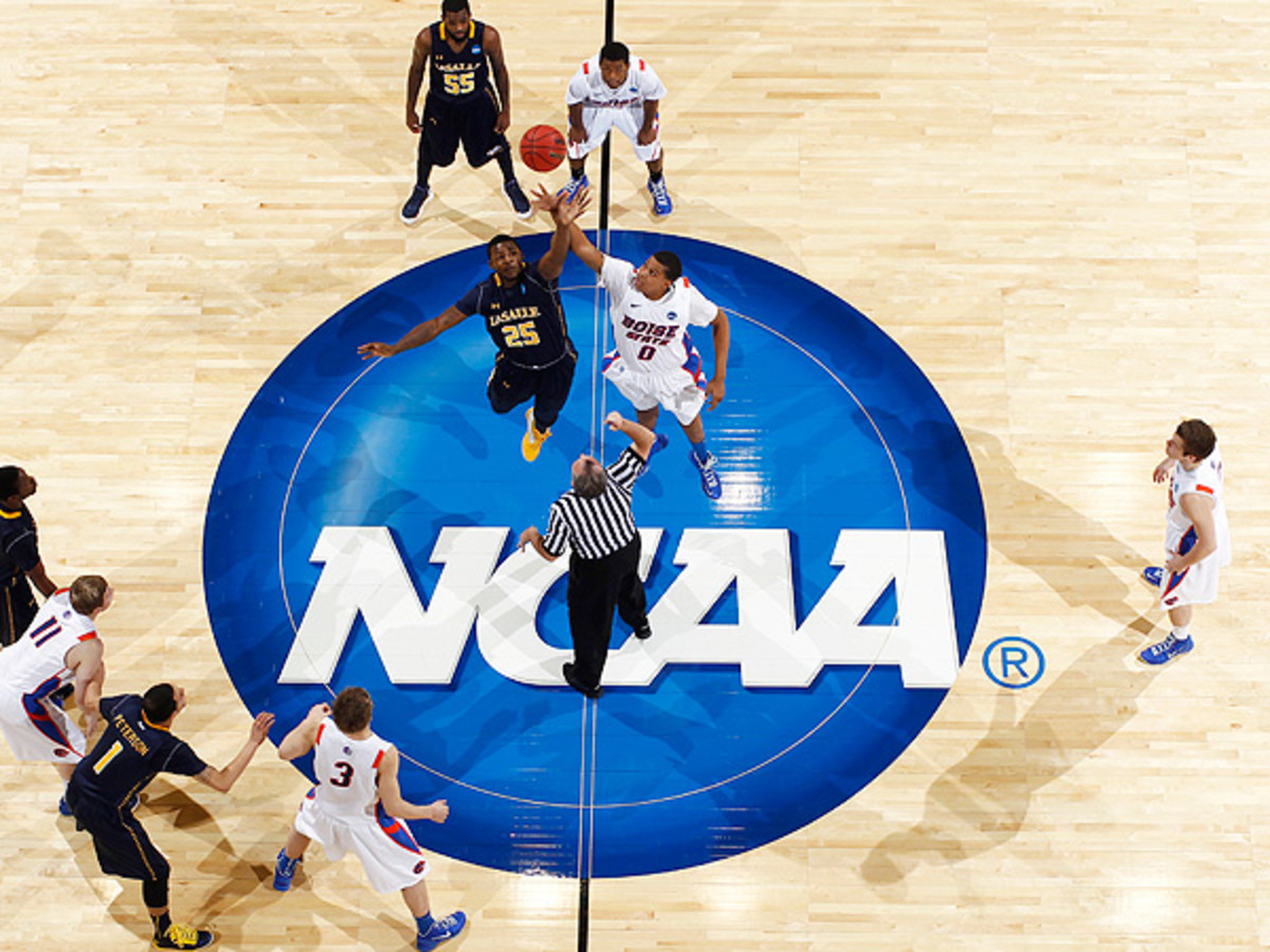 The NCAA is holding off on declaring sites for the First Four of the 2016 tournament and beyond. (Joe Robbins/Getty Images)