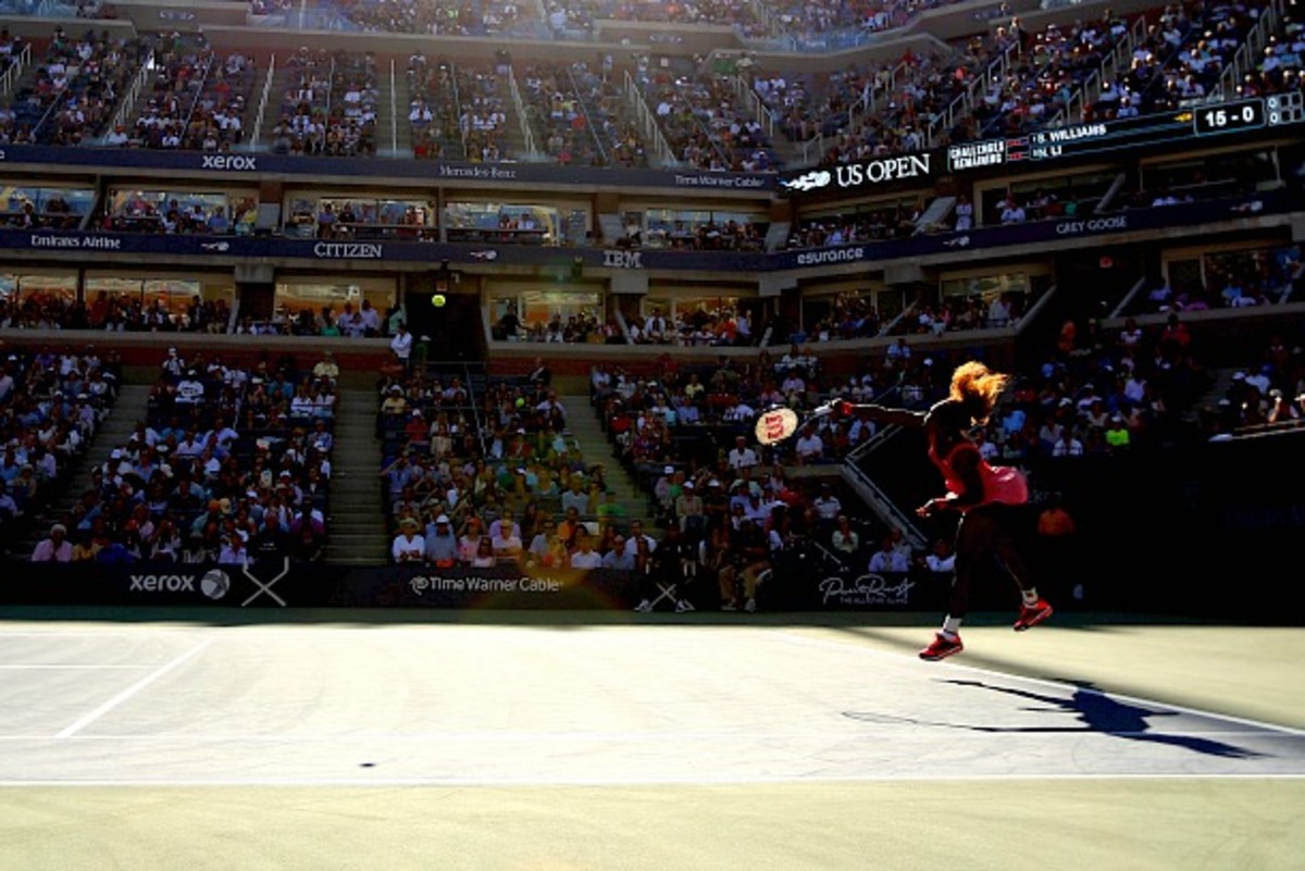 The sun sets as the second set begins. (Al Bello/Getty Images)