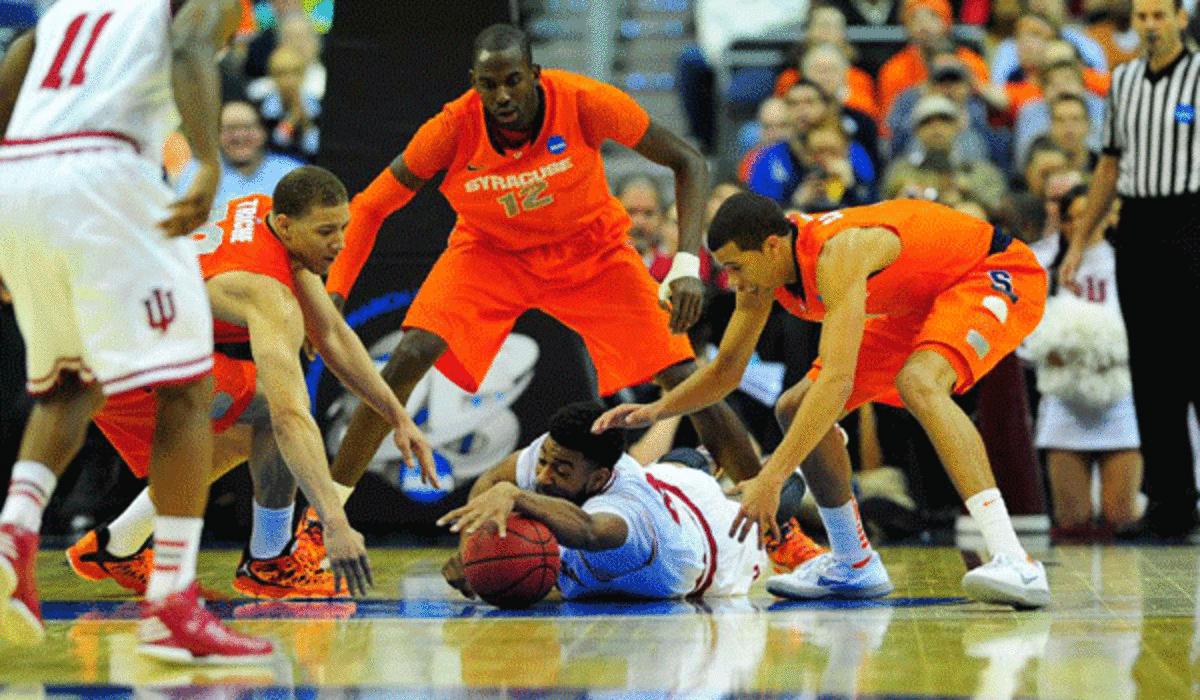 Syracuse's zone defense pushed the Orange ahead by as many as 18 points in the first half vs. Indiana. (SI)