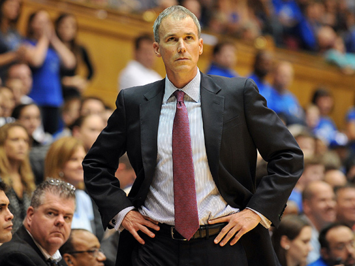 USC coach Andy Enfield has taken an early lead in establishing the team as top dog in California college hoops. (Lance King/Getty Images)