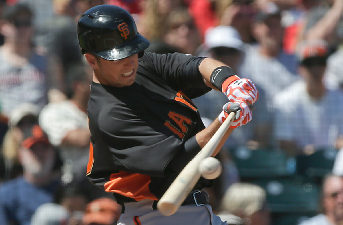 Buster Posey's two healthy seasons have each ended in Giants World Series wins. (Chris Carlson/AP)