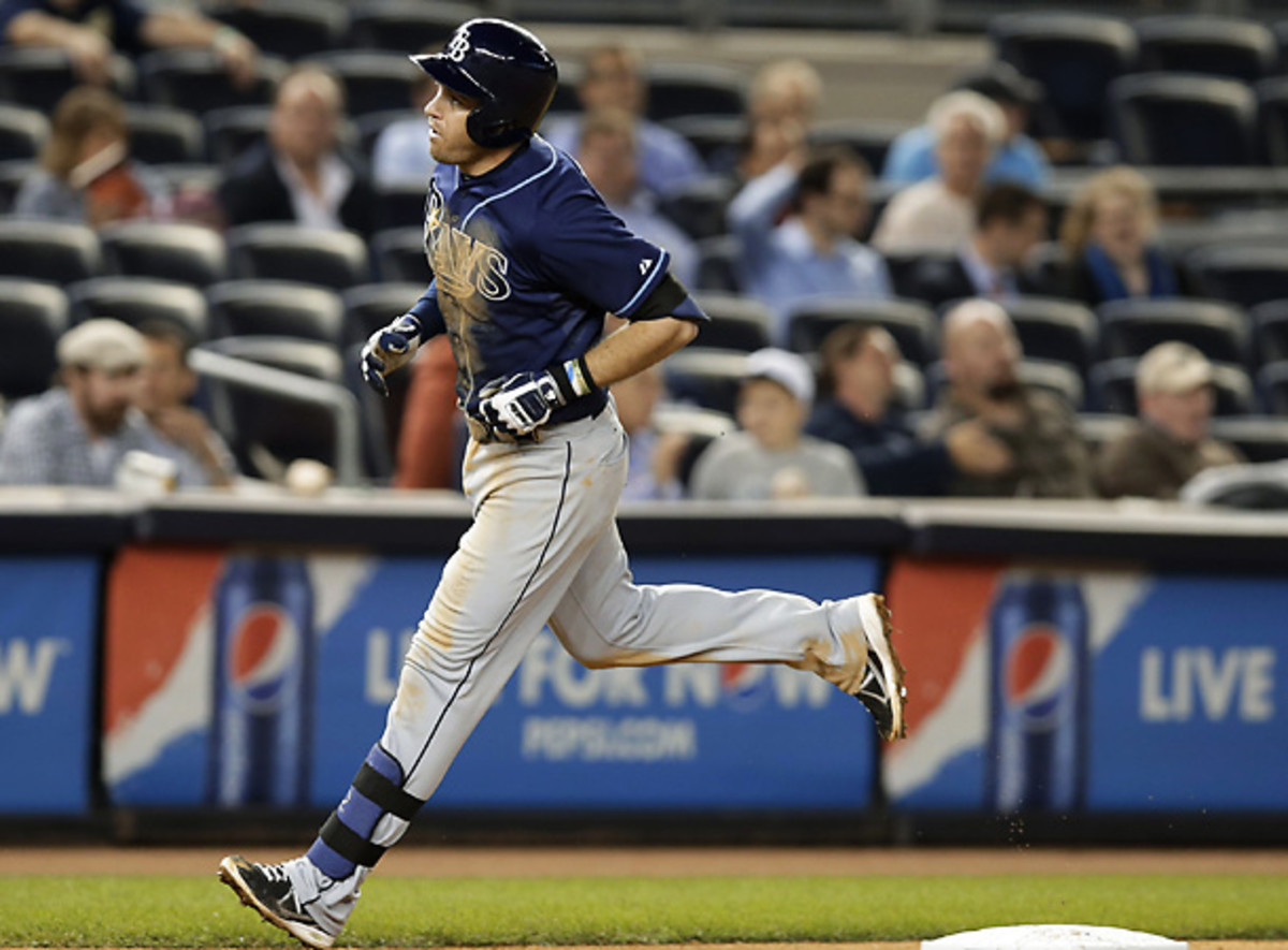 Evan Longoria hit two home runs and helped end the Yankees' postseason hopes. (Kathy Willens/AP)