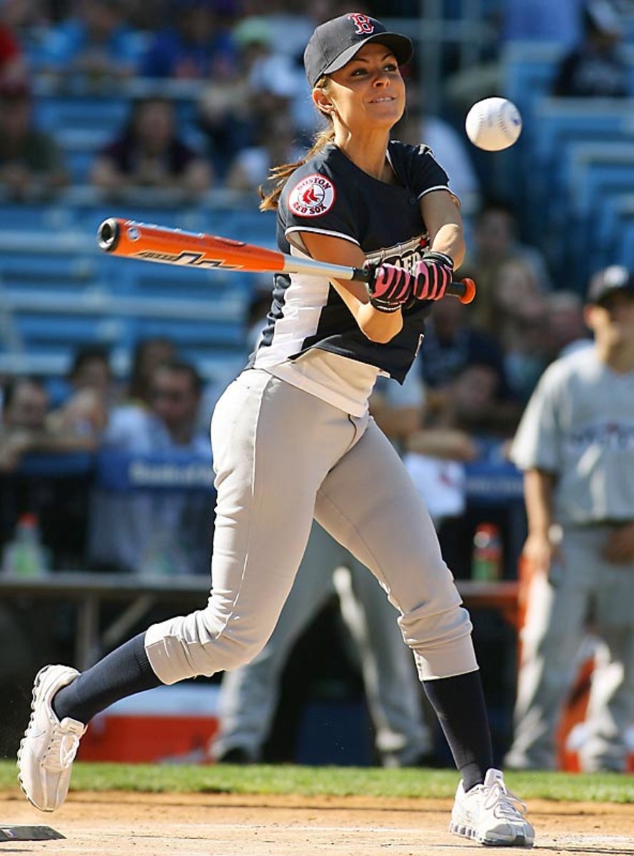 Television host Maria Menounos shows off the Boston Red Sox logo on her  jersey before the All-Star Legends & Celebrity softball game, Sunday, July  11, 2010, in Anaheim, Calif. (AP Photo/Jae C.