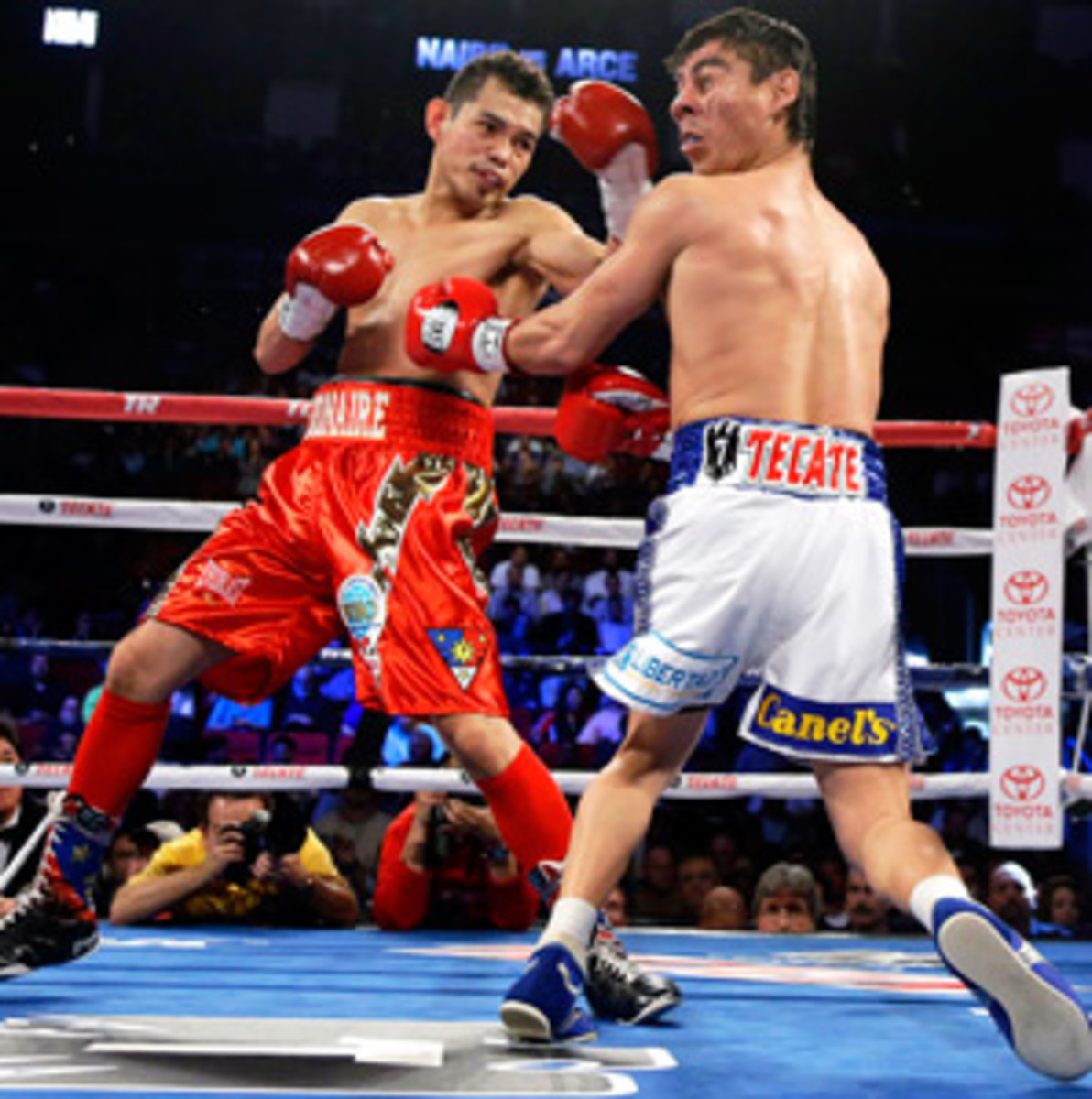 Nonito Donaire (left) scored his 20th career knockout against Jorge Arce.