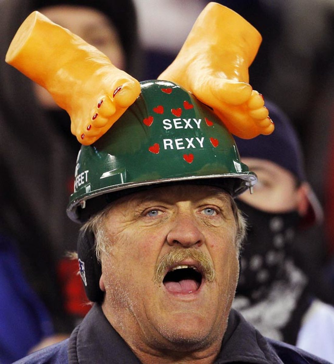 Best head gear at the dome - #vikings fan with cheese grat…