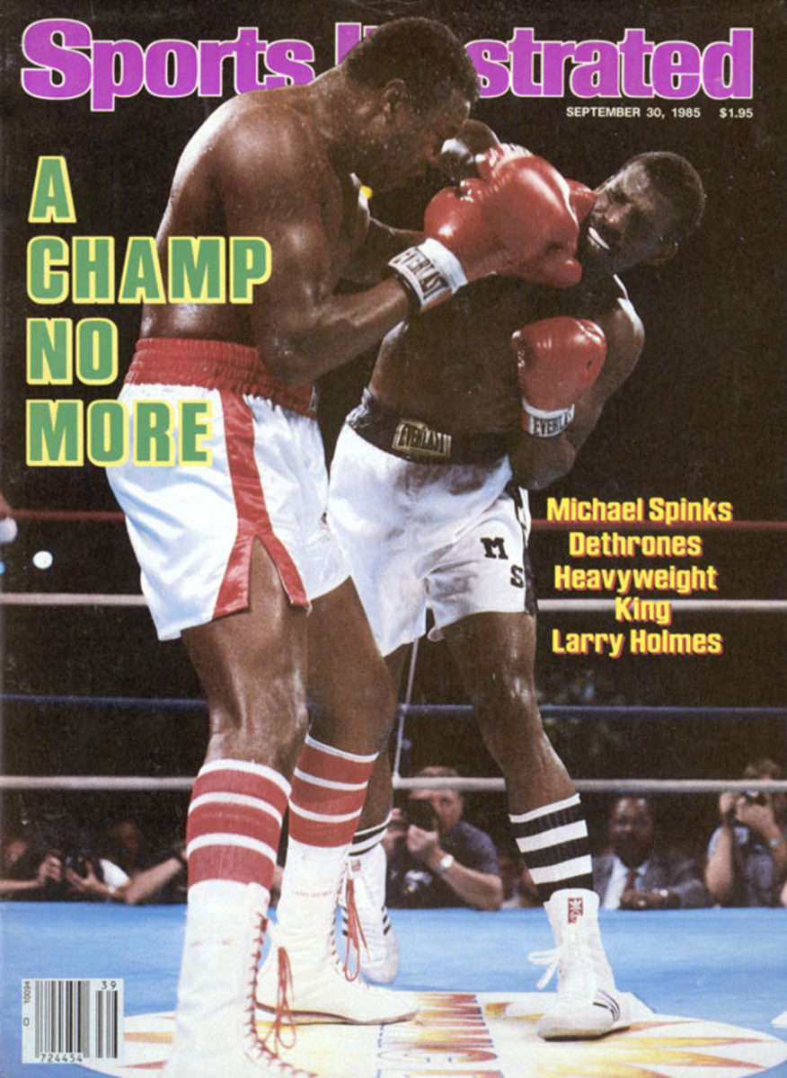 Michael Spinks and Larry Holmes