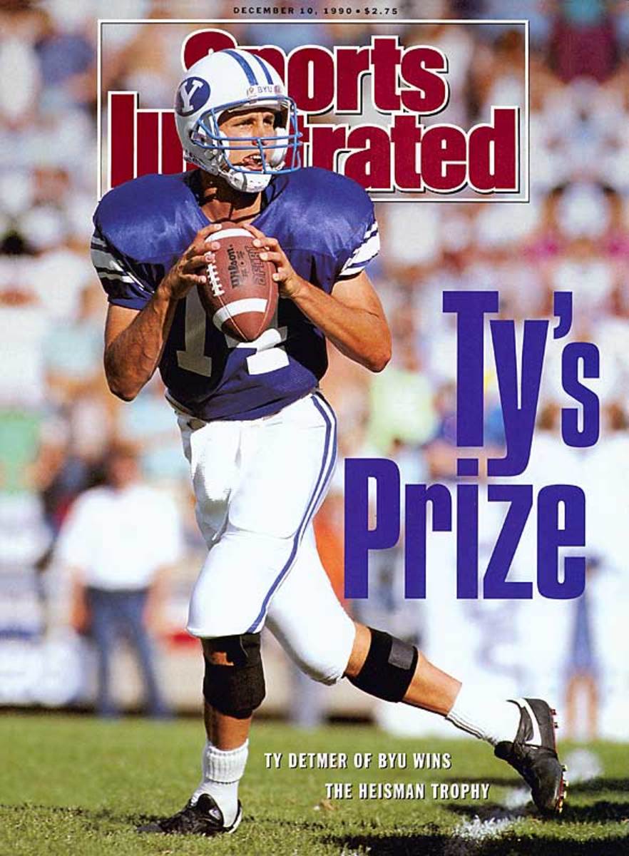 That guy was a Niner? #23 Ty Detmer. 1990 Heisman Trophy and Maxwell Award  winner. Spent the 1998 season in Red and Gold serving as Steve Young's  backup. He threw for 312