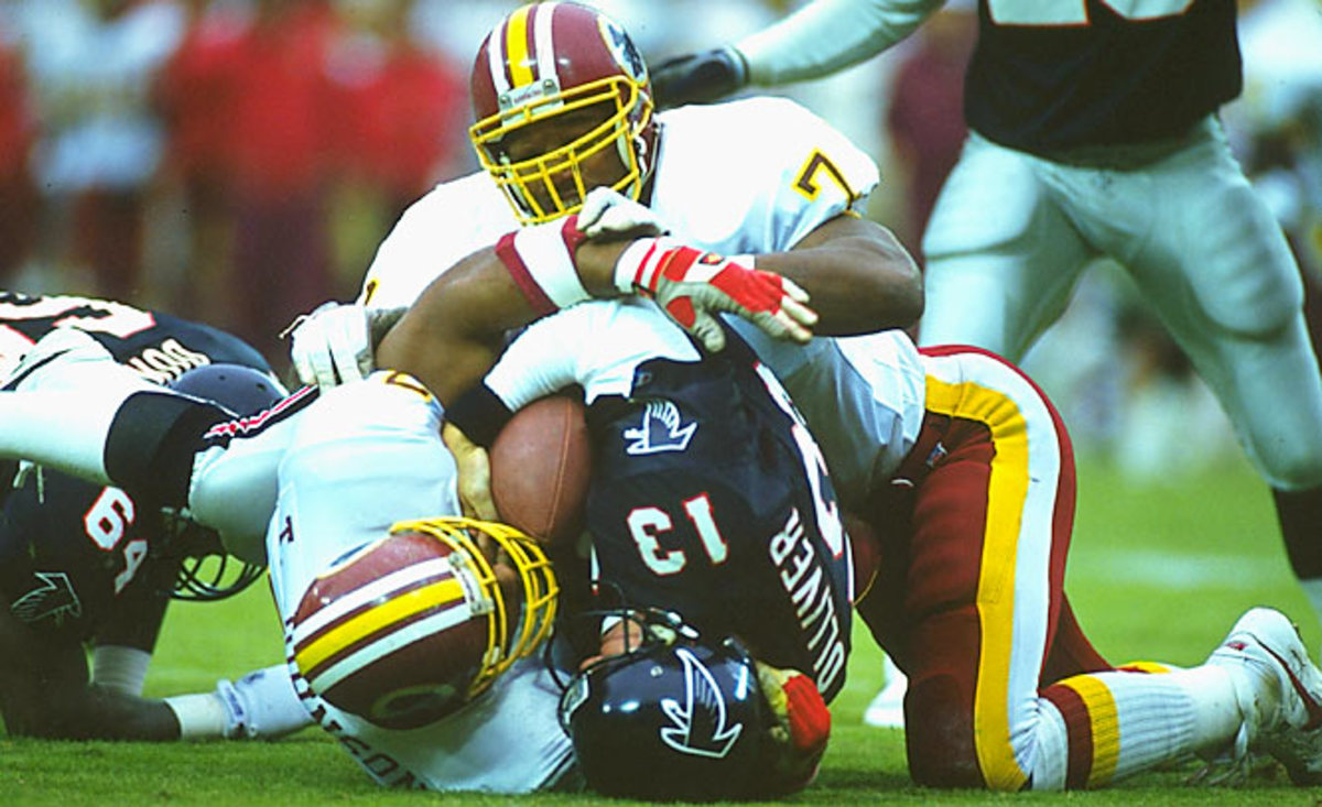 San Francisco, California, USA. 12th Jan, 1991. San Francisco 49ers vs  Washington Redskins at Candlestick Park Saturday, January 12, 1991. 49ers  beat Redskins 28-10. Redskin quarterback Mark Rypien (11) moves away from