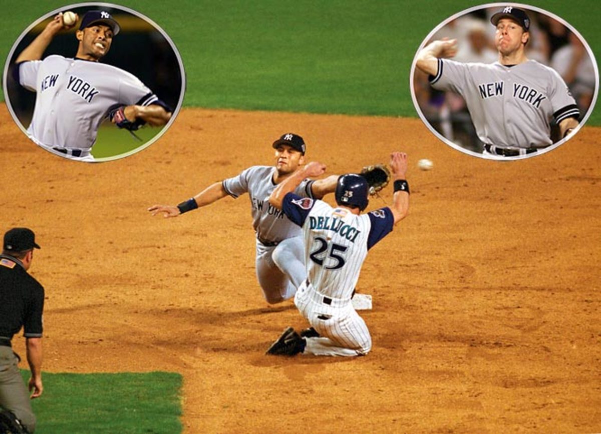 New York Yankees' third baseman Scott Brosius throws to first