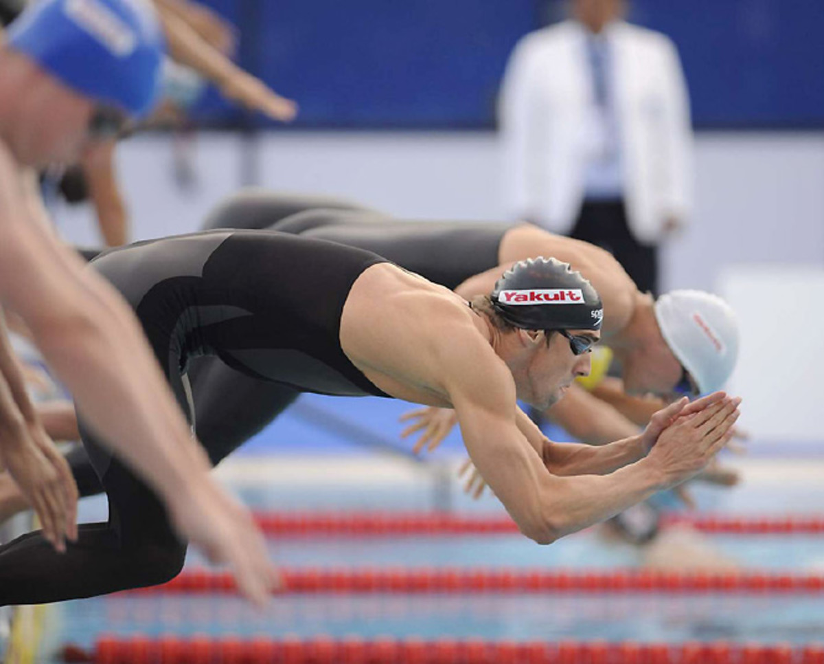 Michael Phelps swimming the butterfly leg in the 400 medley relay