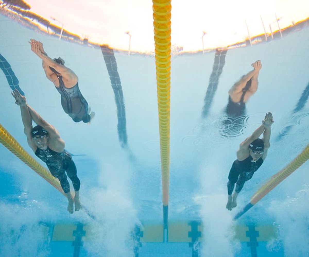 Michael Phelps (left) and the U.S team won gold in the 4 x 200m relay 