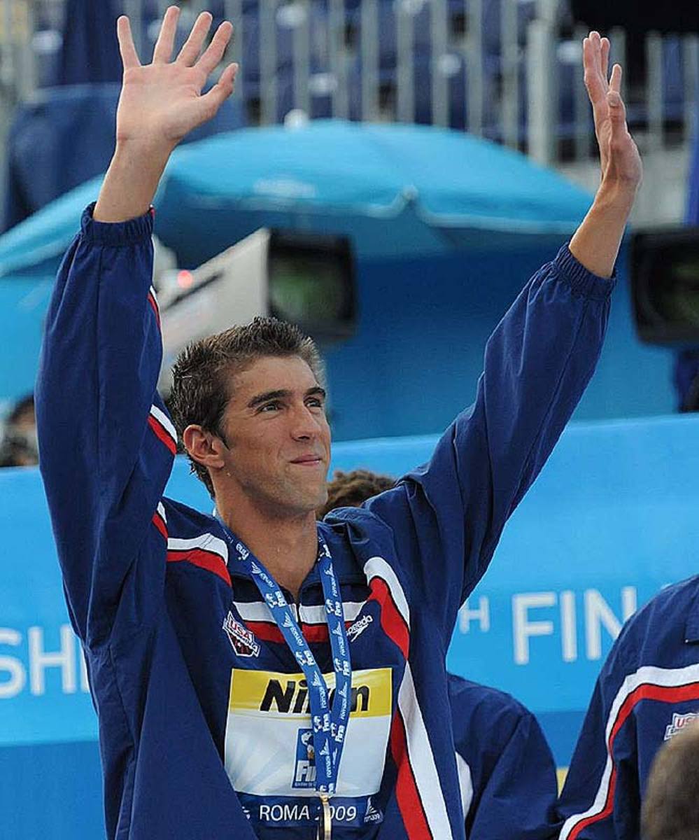 Michael Phelps celebrates after 4 x 100m freestyle relay