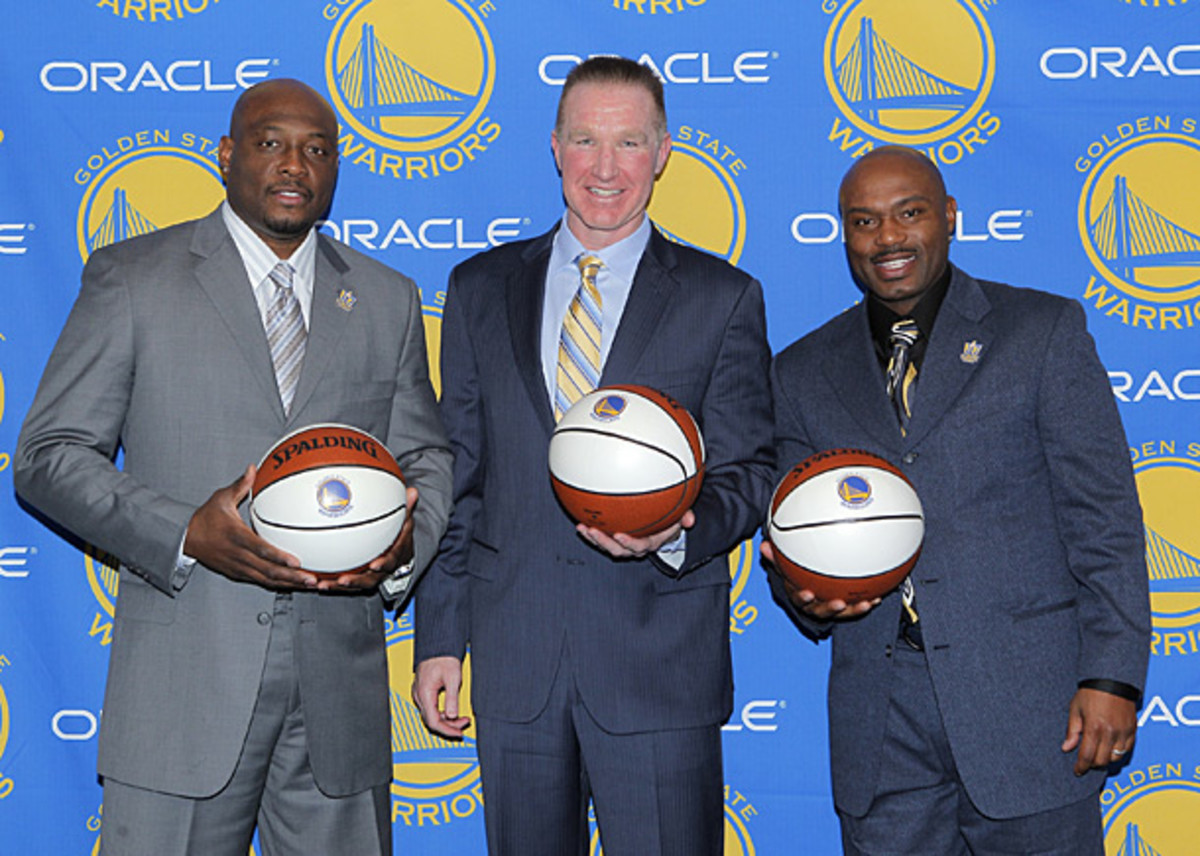 Richmond, Mullin and Hardaway pose at Mullin's jersey retirement ceremony last March. ( Rocky Widner/NBAE via Getty Images)