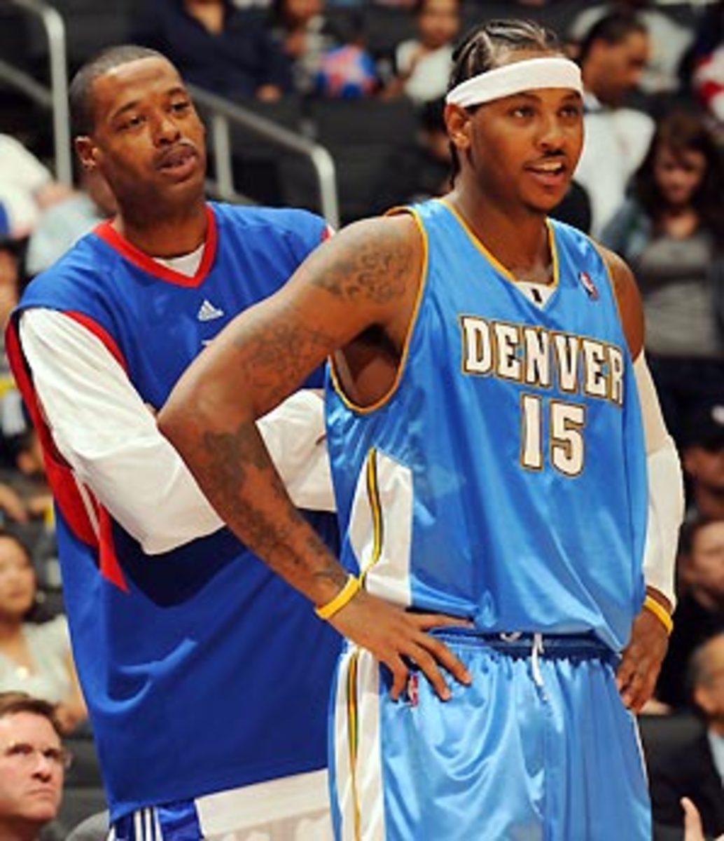 The West's Carmelo Anthony, left, and Kobe Bryant sit on the bench  during the 2010 NBA All-Star Game at Cowboys Stadium in Arlington, Texas,  Sunday, February 14, 2010. (Photo by Ron Jenkins/Fort