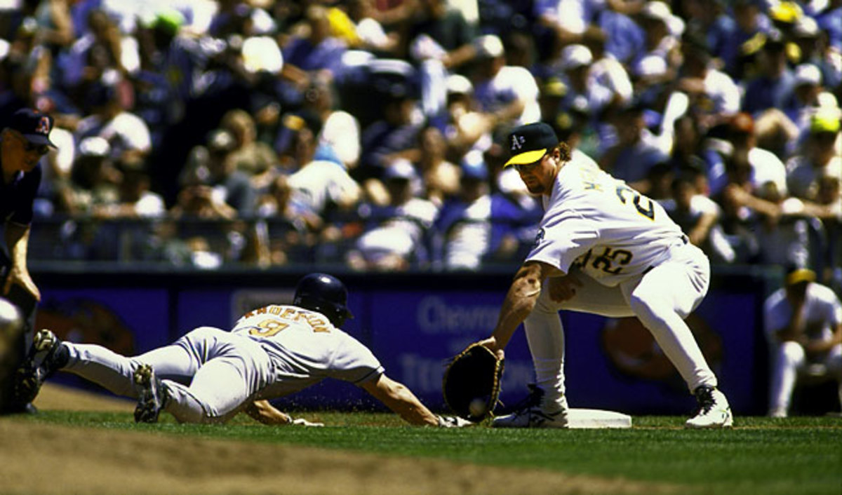 McGwire tags out Brady Anderson at first