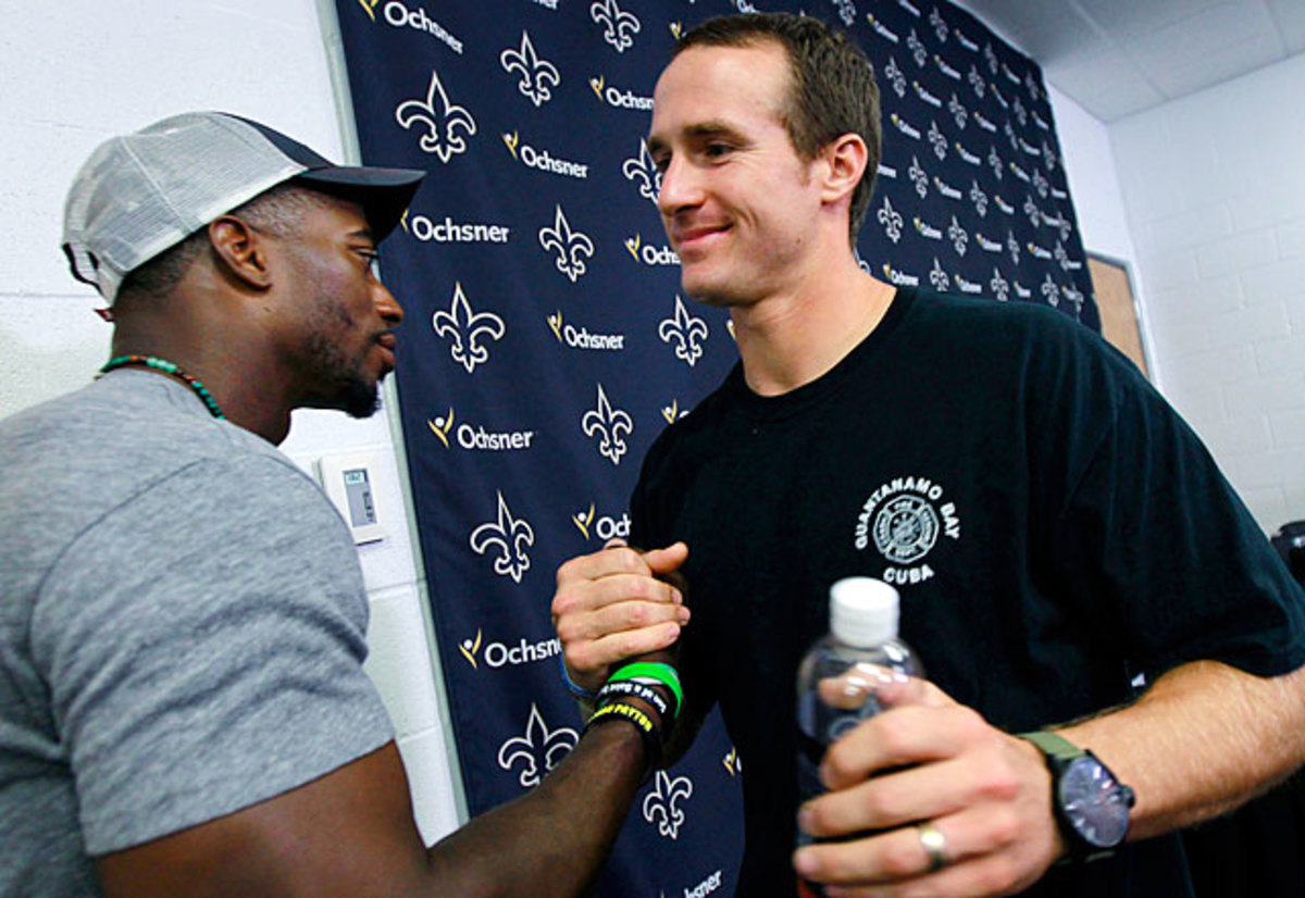 Roman Harper and Drew Brees