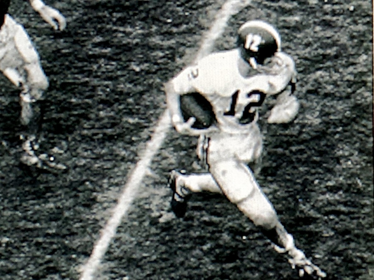 Kenny Stabler run in the mud