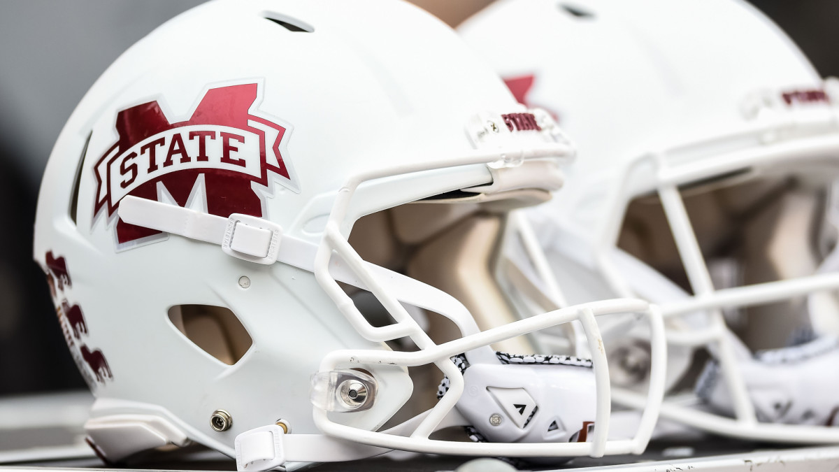 Mississippi State Bulldogs helmets on the sideline of a game