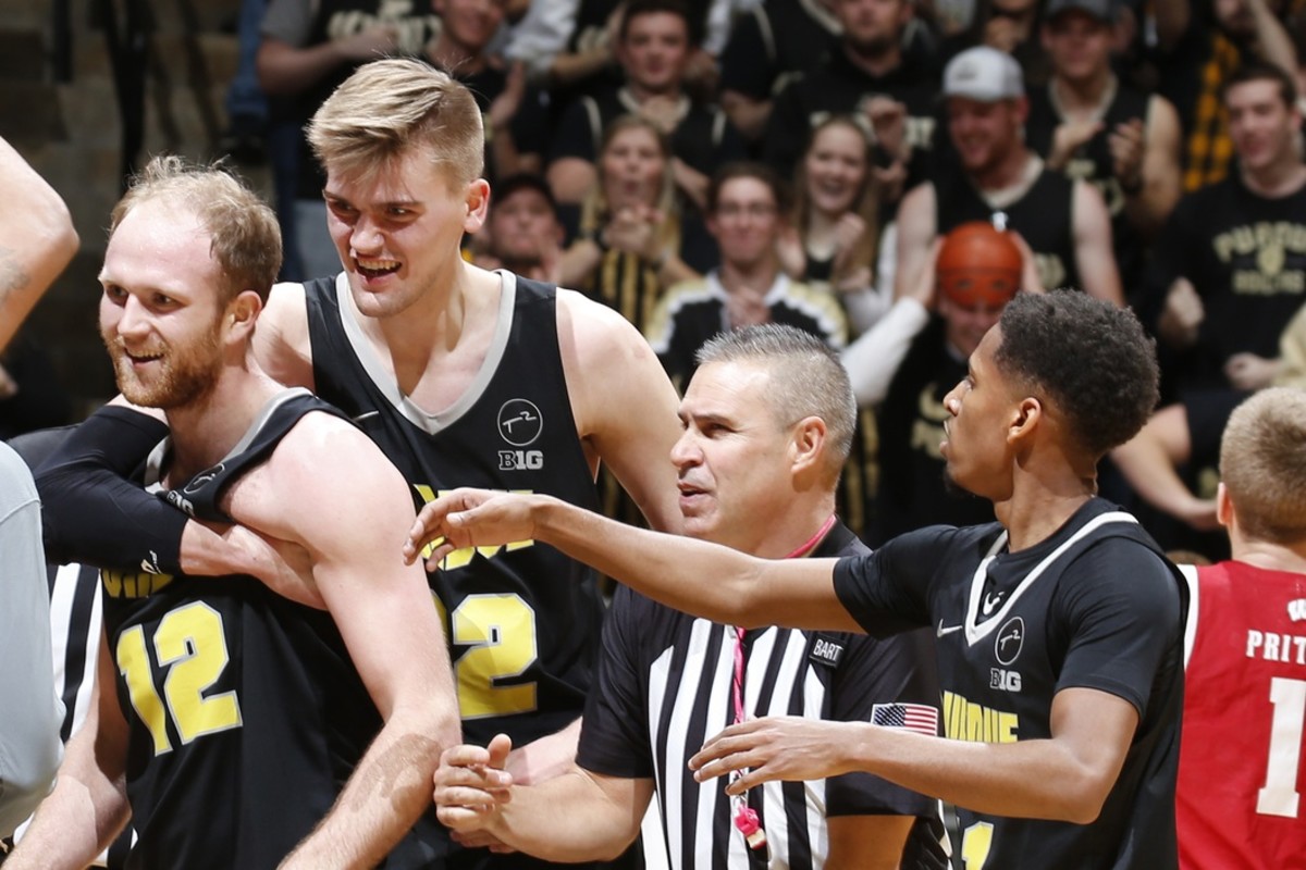 Purdue's Evan Boudreaux celebrates with teammates after a timeout during their big first-half run. (USA TODAY SPORTS)