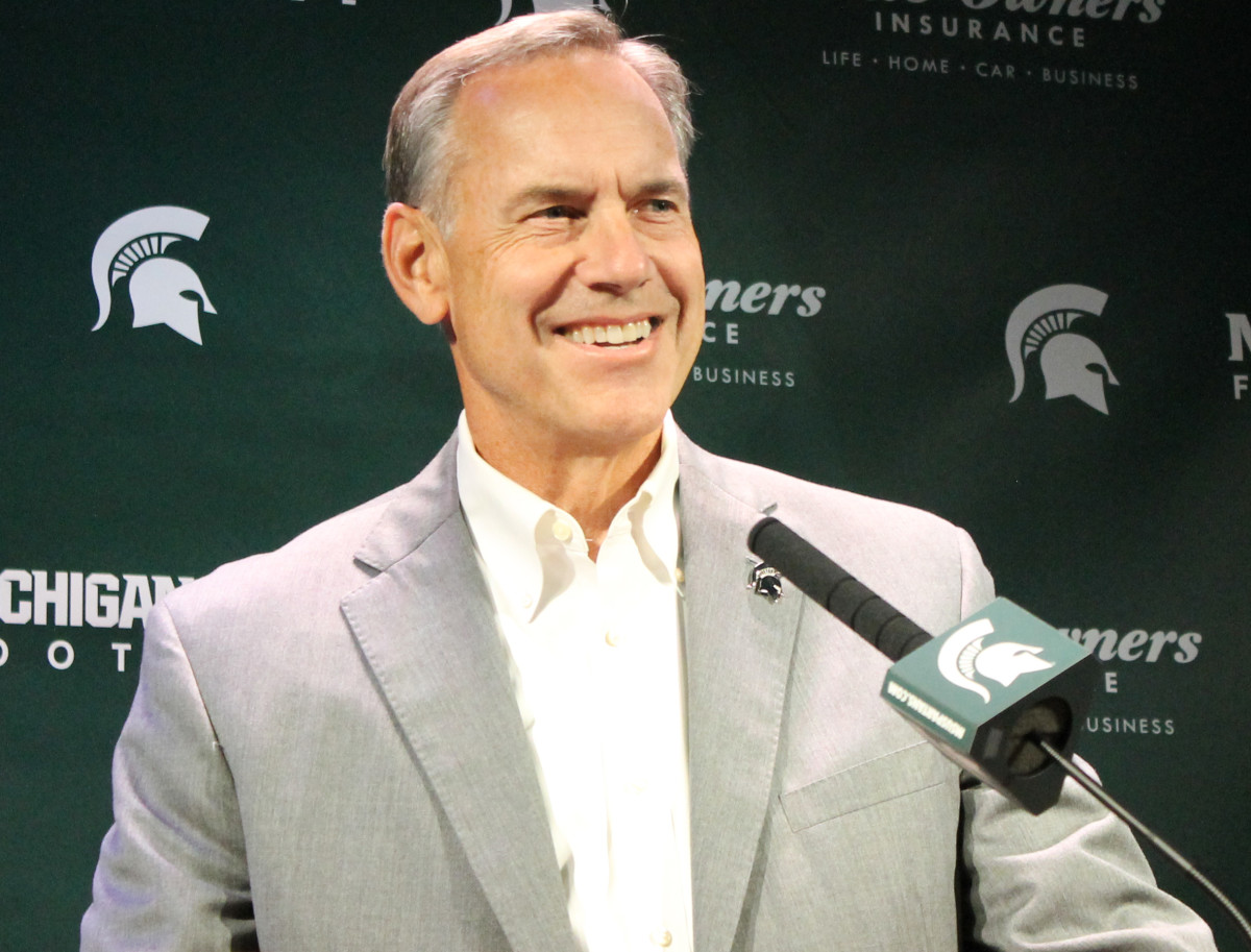 Mark Dantonio flashed a big smile while preparing for his Spartans game versus Wisconsin.