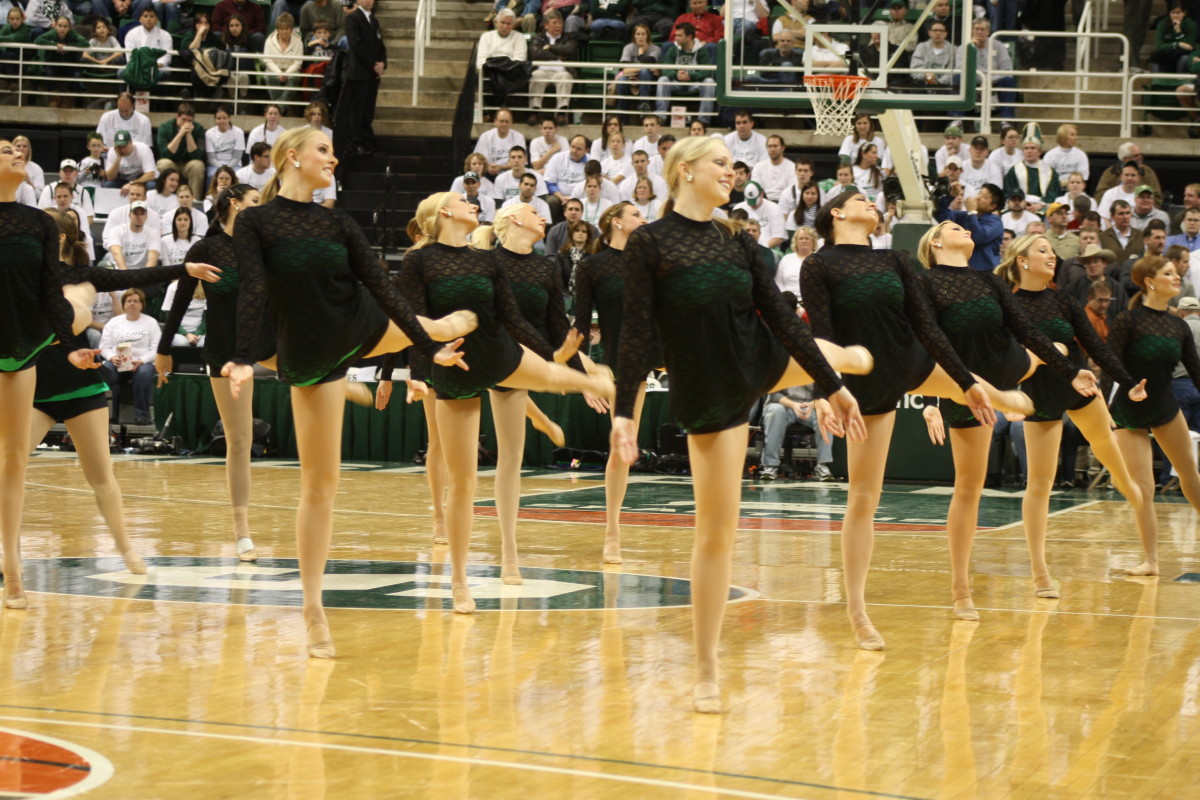 Not sure we want to see the Spartan Nation writing staff dancing like these ladies, but we can all agree that March is a time to celebrate Spartan Basketball.  Photo courtesy of Mark Boomgaard.