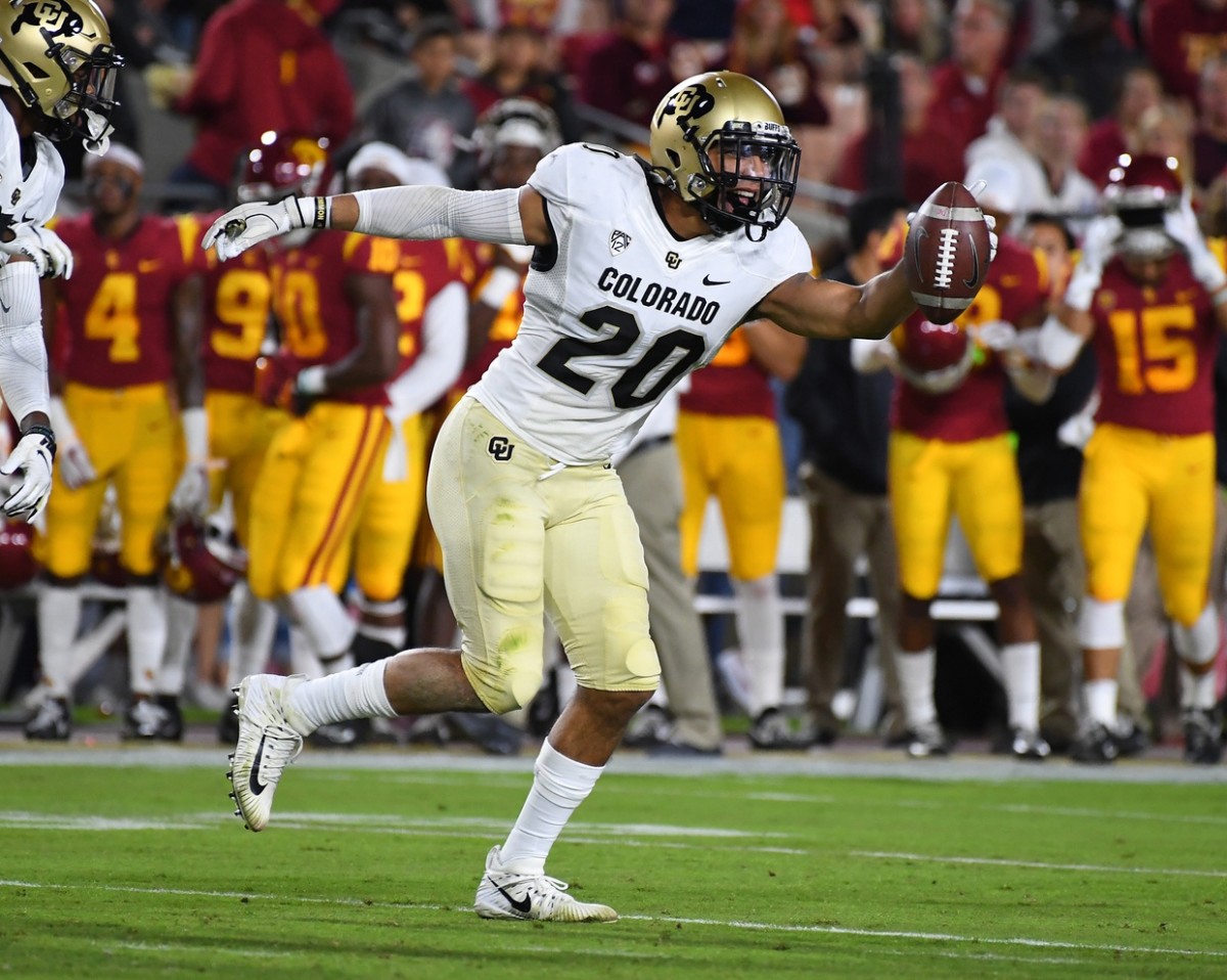 What do Colorado Buffaloes 'L' and 'D' jersey patches mean?