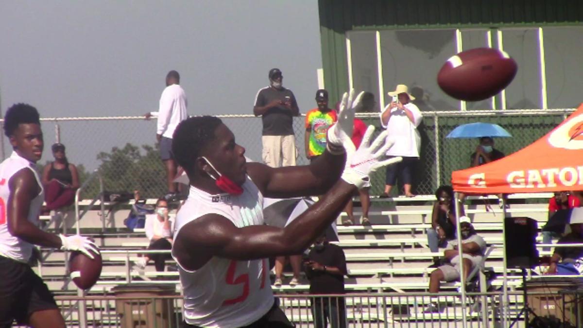 Owens makes a catch in a drill at the camp. That is one of the extra pluses as he is also a good receiver out of the backfield very early in his career. Owens is multi-talented.