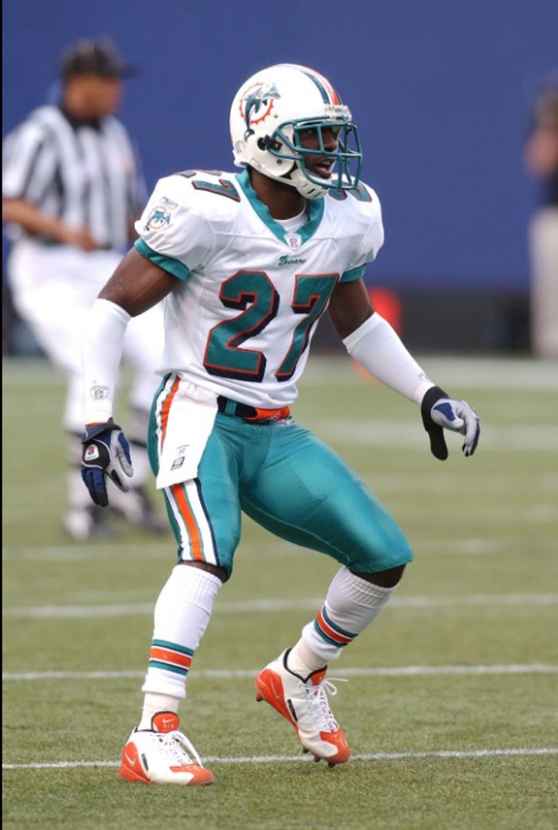 MIAMI DOLPHINS AUTOGRAPHED 8 X 10 COLOR PHOTO TERRELL BUCKLEY