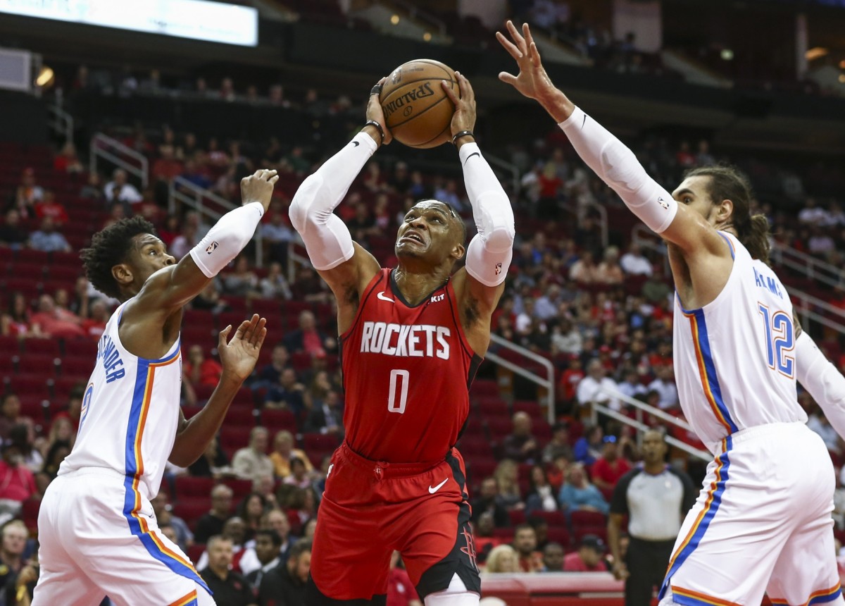 russell-westbrook-and-steven-adams-go-at-it-during-a-timeout-in-game