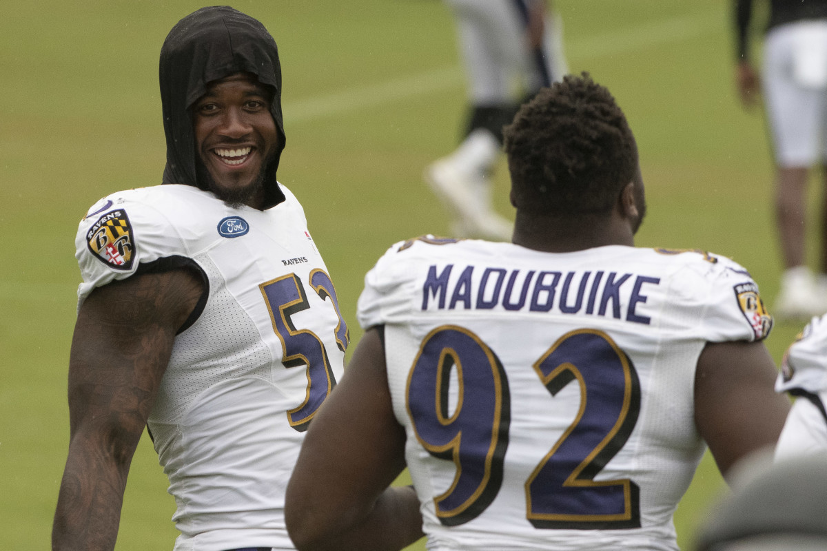 Baltimore Ravens defensive tackle Justin Madubuike (92) gets to