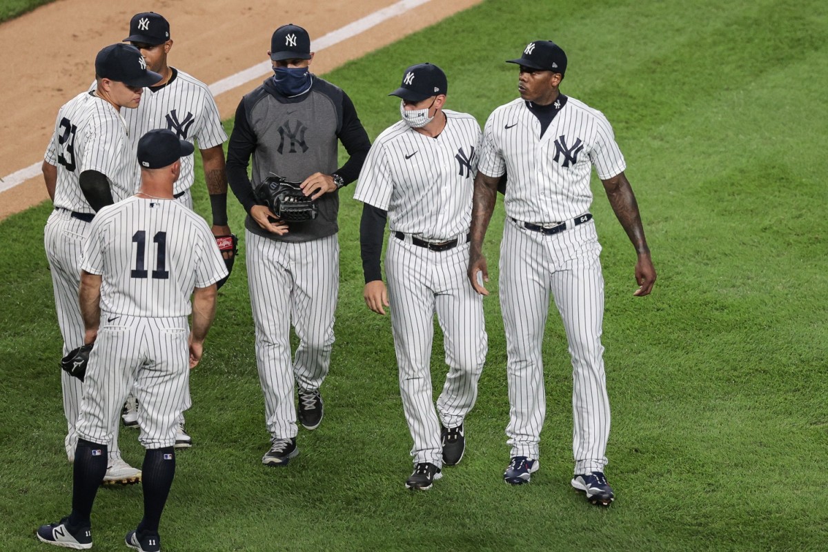 Benches empty after Aroldis Chapman's brushback pitch as Yankees