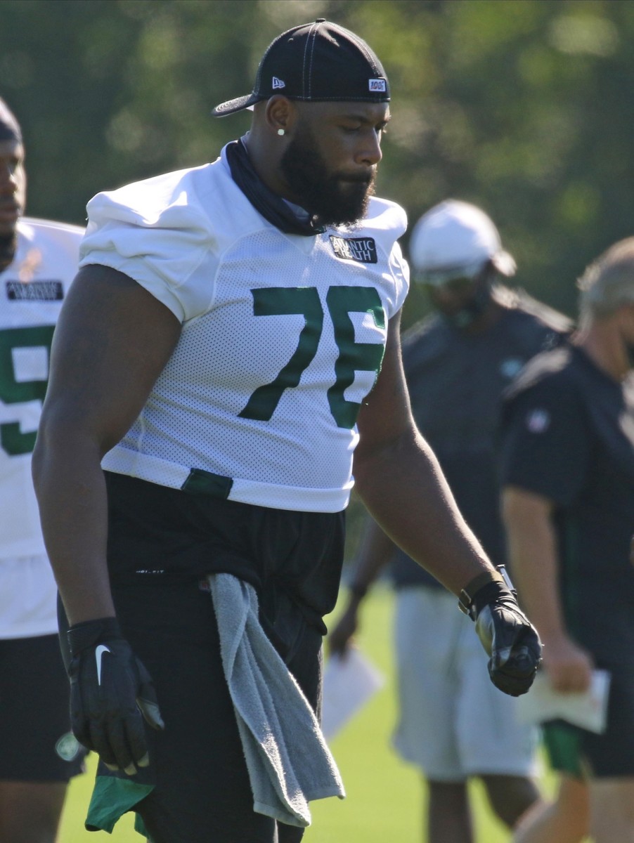 Competition at Right Tackle Energizes and Challenges George Fant