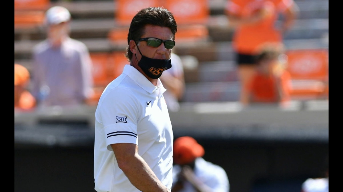 Mike Gundy has praised crowds, but encouraged the school to allow more fans inside the stadium.