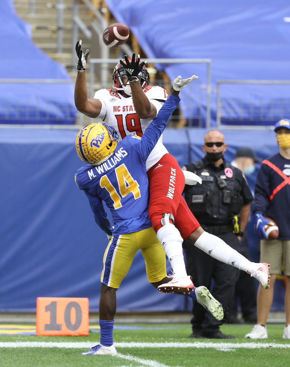 C.J. Riley goes up high to catch a pass from Devin Leary