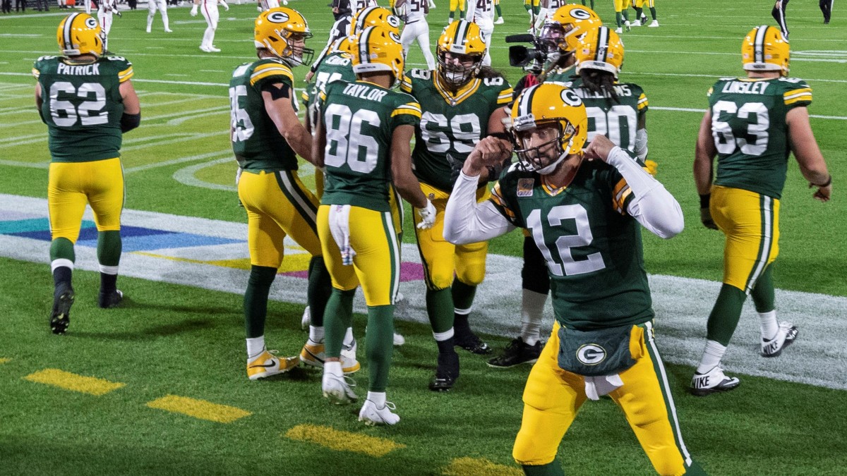 Rodgers, Tonyan lead Packers to 30-16 victory over Falcons