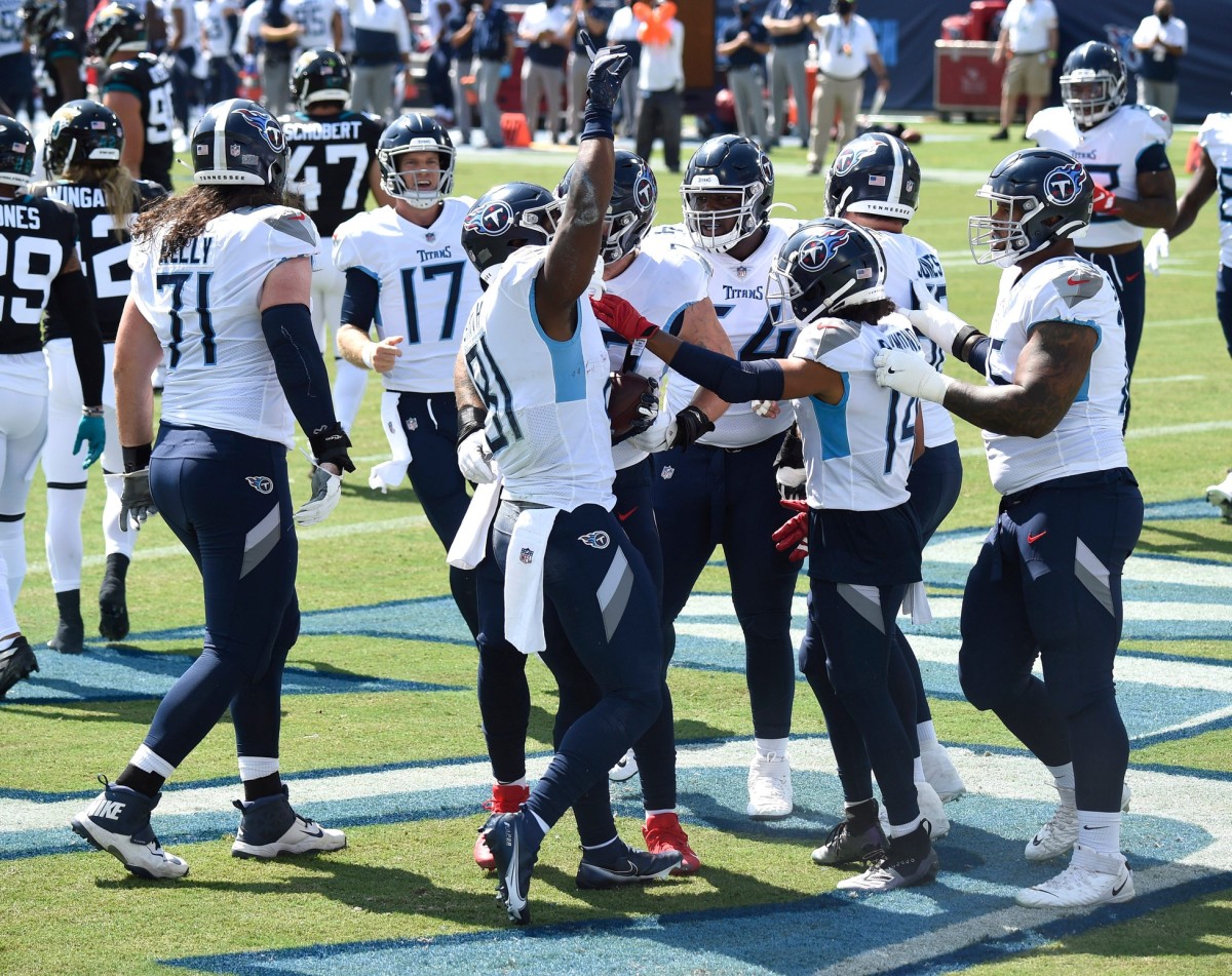 Tennessee Titans tight end Jonnu Smith (81) celebrates one of his three TD receptions this season.